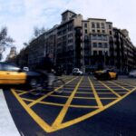 Taxi at the intersection of Balmes Street and Ronda de la Universidad in Barcelona.