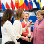 European Parliament President Roberta Metsola and European Commission President Ursula von der Leyen with Angela Merkel.