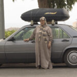 Moroccan Woman and Mercedes, Mediterranean Highway, 16 August 2005.